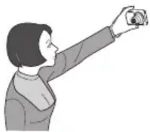 CASIO Exilim EX-ZS30 - Press the shutter button all the way down, and point the camera at yourself. - 1