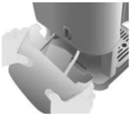 Close-up of hands operating a kitchen appliance (no visible text or symbols)