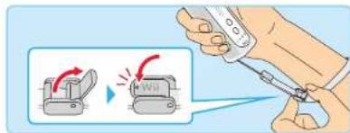 Illustration showing a hand using a tool to adjust or install a device with red and green directional arrows, indicating rotation or adjustment.