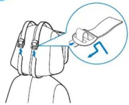 Line drawing of a person's shoulder and shoulders with a magnified inset showing the hand holding a wrist (no text or symbols)