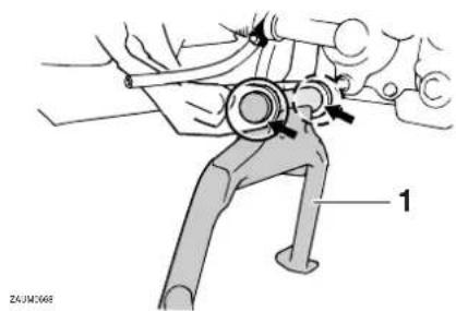 YAMAHA XCITY250 - Checking and lubricating the centerstand and sidestand - 2