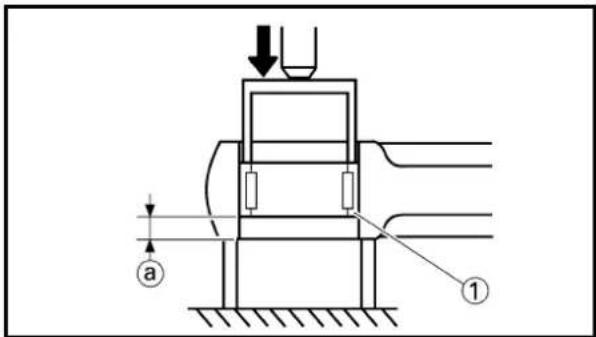 Technical diagram of a mechanical device with labeled components and directional arrows indicating motion or flow.