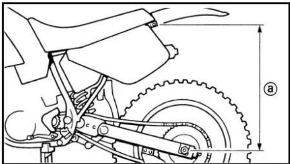 Technical diagram of a bicycle's front wheel assembly with labeled dimensions and components