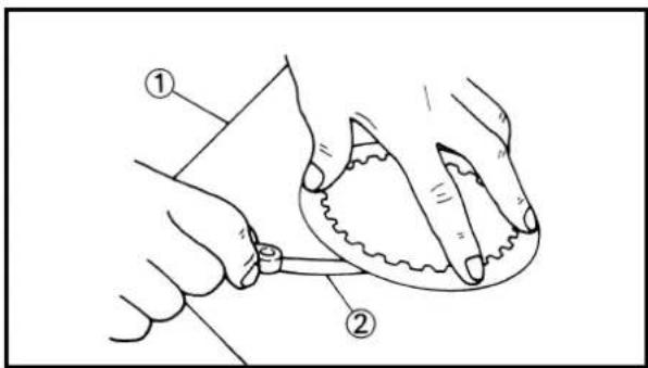 Diagram showing two hands operating a tool with labeled parts, likely illustrating a procedure or procedure in a technical or mechanical context.