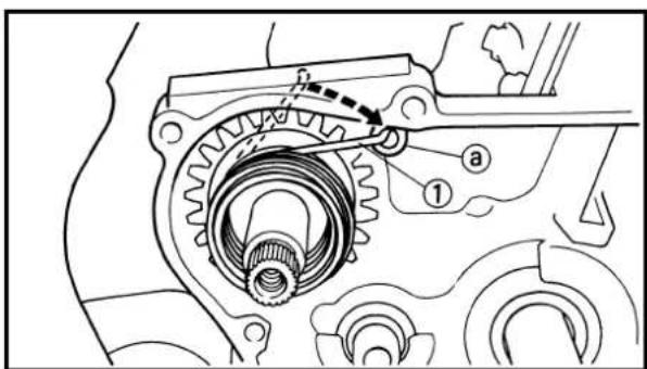 Technical diagram of a mechanical gear assembly with labeled parts and directional arrow