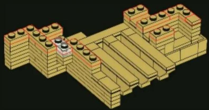3D architectural diagram of a multi-story building complex with yellow and beige blocks, featuring embedded circular components (no text or symbols)