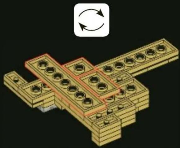 3D diagram of a mechanical assembly with yellow blocks and red highlighted sections, showing rotational motion (no text or symbols)
