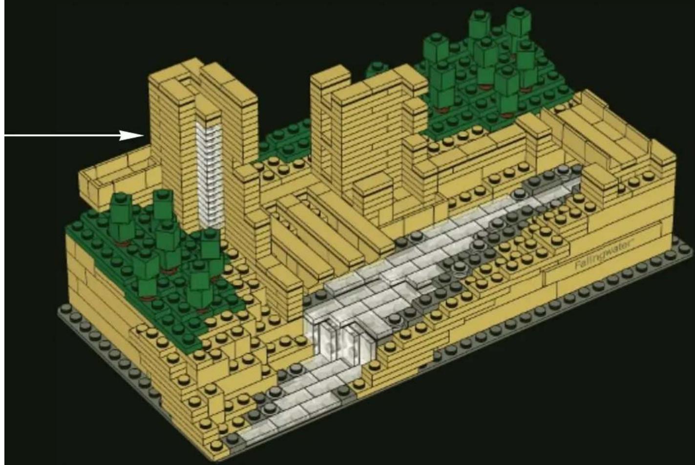 3D architectural model of a building complex with green trees and yellow brick walls, labeled 'Fallingwater' at the base (no other text or symbols)