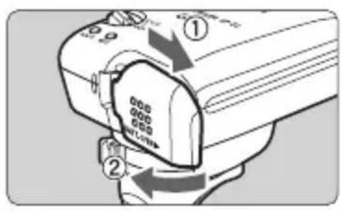 CANON GP-E2 - Inserción de la pila - 1