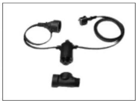 Black and white photo of a handheld electronic device with two connectors and wires (no text or symbols visible)