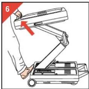 Illustration of a hand using a desktop computer to lift a device (no text or symbols visible).