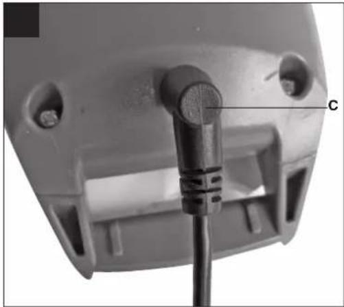 Close-up of a mechanical component with a labeled section (C) and a black threaded rod inserted, showing mounting holes and a base plate.