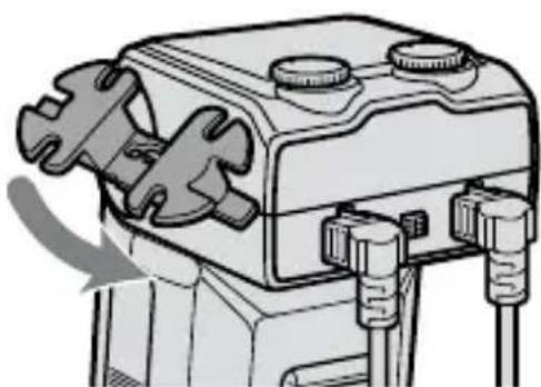 SONY HVL-MT24AM - Attaching the cord reel to the macro flash controller - 1