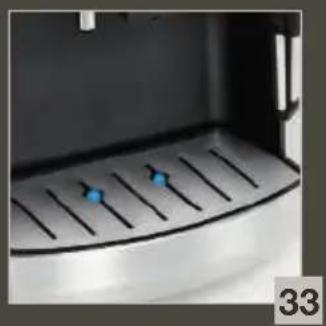 Close-up of a kitchen sink with blue indicator lights on a metal grater (no text or symbols visible)