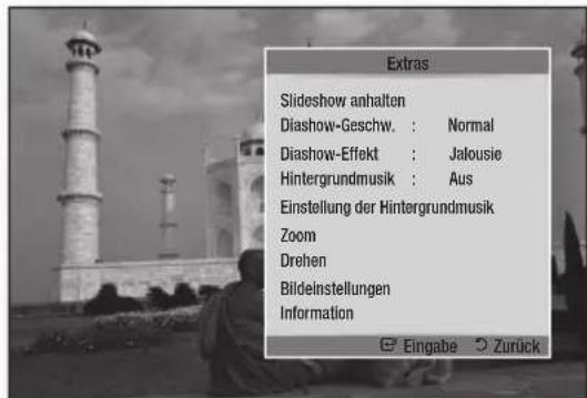 Extras Slideshow anhalten Diashow-Geschw. : Normal Diashow-Effekt : Jalousie Hintergrundmusik : Aus Einstellung der Hintergrundmusik Zoom Drehen Bildeinstellungen Information Eingabe Zurück