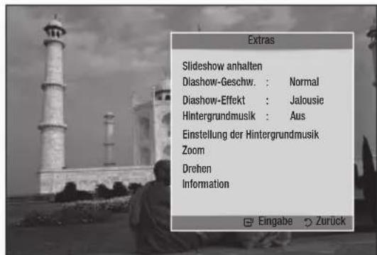 Extras Slideshow anhalten Diashow-Geschw. : Normal Diashow-Effekt : Jalousie Hintergrundmusik : Aus Einstellung der Hintergrundmusik Zoom Drehen Information Eingabe Zurück