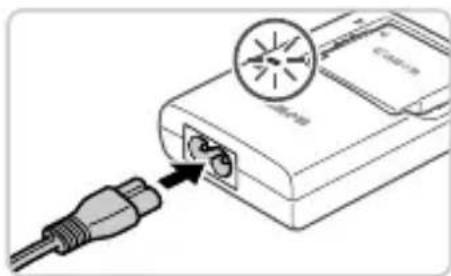 CANON Ixus 125 HS - Remove the cover and insert the battery. - 1