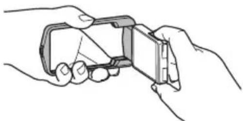 CASIO Exilim EX-TR200 - 如图所示握住相机。 - 1