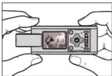 Illustration of two hands holding a handheld device with a small screen and control panel (no text or symbols visible)