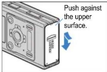 Push against the upper surface.