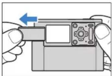 Illustration of hands holding a camera module with a blue arrow indicating left motion (no text or symbols)