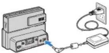 Diagram showing connection between a device with a power outlet and cable (no text or symbols)