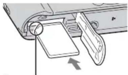 Diagram of a device's internal components, showing a magnified view of a component with an arrow indicating direction (no text or symbols present)