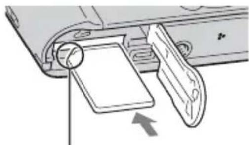 Diagram of a device's internal components, showing a magnified view of a rectangular component and a folded paper or sheet (no text or symbols present)