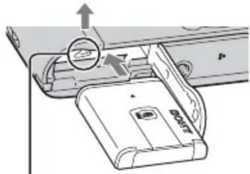 Diagram of a device with an attached device showing internal components and directional arrows (no text or symbols)
