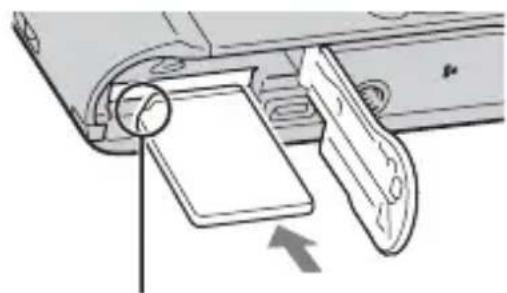 Diagram of a device's internal components with a magnified view showing a circular detail and an arrow indicating direction (no text or symbols present)