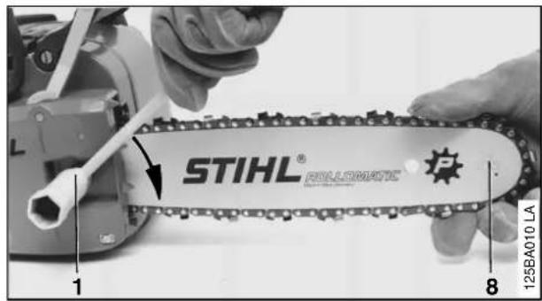 STIHL 009 - Mounting the Bar and Chain - 11