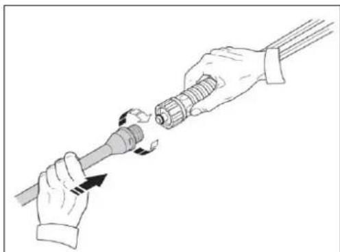 Illustration of two hands holding a tool with a probe inserted, showing mechanical assembly (no text or symbols)