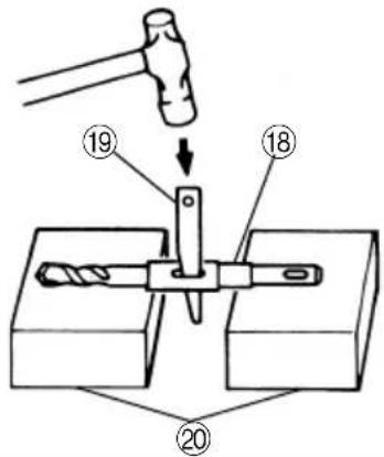 Diagram illustrating a hammer tool interacting with a drill bit, labeled with parts 18 and 20.