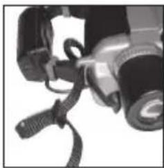 Close-up of a camera with attached cable and lens (no visible text or symbols)