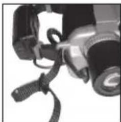 Close-up of a mechanical component with a strap and clasp (no visible text or symbols)