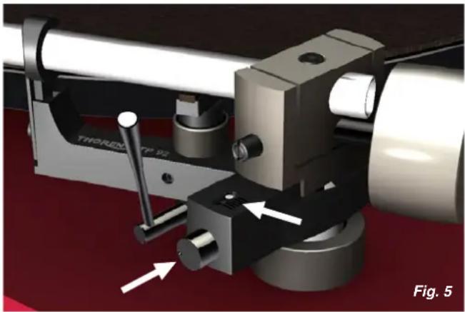 Mechanical assembly diagram showing a lathe tool with directional arrows indicating movement or force (no text or symbols present)