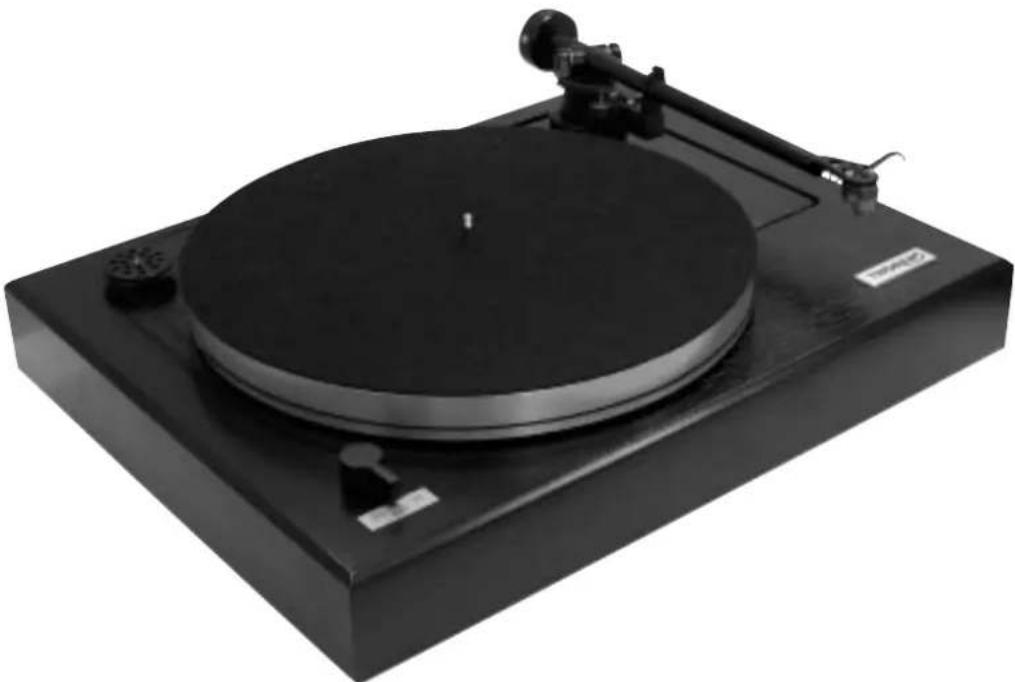 Black circular rotat on a square base with a flat top and mechanical lever (no visible text or symbols)