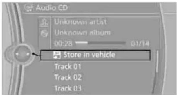 BMW 750i Sedan (2009) - Storing music from CDs/DVDs - 1