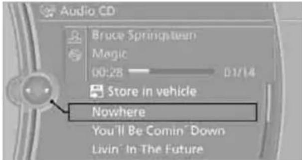 BMW 750i Sedan (2009) - Selecting the track using the iDrive - 1