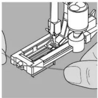 BERNINA Artista 165 - Hooking the cord in the automatic buttonhole foot No. 3A - 1