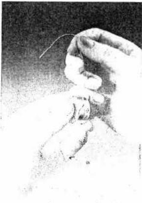 PFAFF 90 - Inserting a Full Bobbin into Bobbin Case - 2
