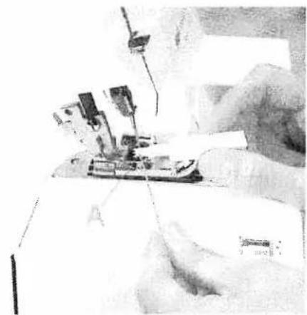 PFAFF coverlock 4872 - Changing a spool on a threaded machine - 1