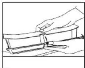 Line drawing of a hand holding a tool over a mechanical component (no text or symbols)