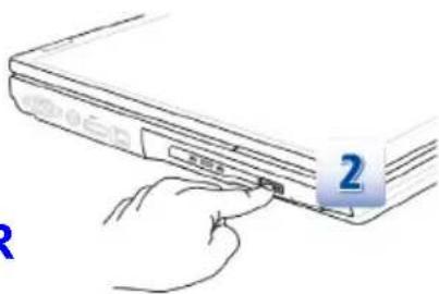 Hand holding a laptop with label '2' pointing to the right side, indicating a step or section number.