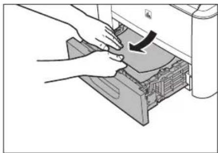 CANON imageClass D1120 - Push downward on the jammed paper as you remove it. - 1