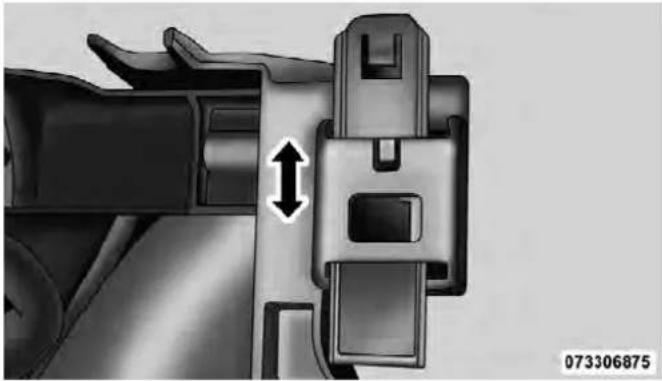Mechanical component diagram showing a piston and belt assembly with bidirectional arrow indicating movement (no text or symbols)