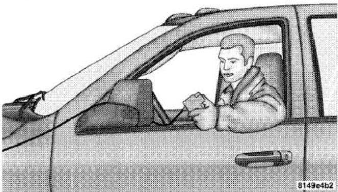 Illustration of a person sitting in a car, holding a smartphone (no text or symbols visible)