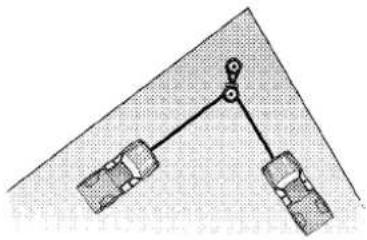 Simple mechanical diagram showing a lever system with two blocks and a fulcrum (no text or symbols)