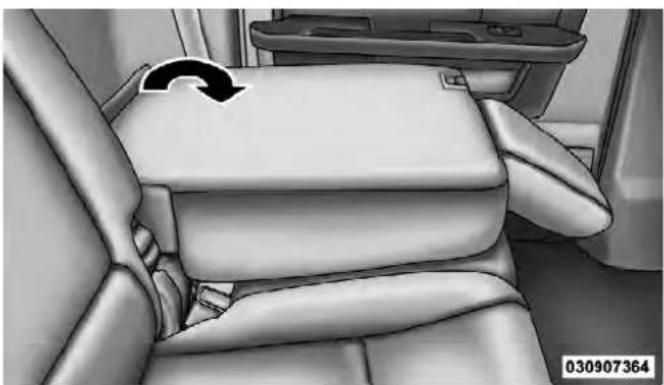 Interior view of a car seatbelt in a vehicle, showing seat and seat compartments with no visible text or symbols