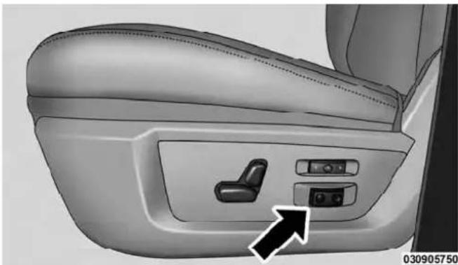 Interior view of a car seat with a control panel and directional arrow (no text or symbols)